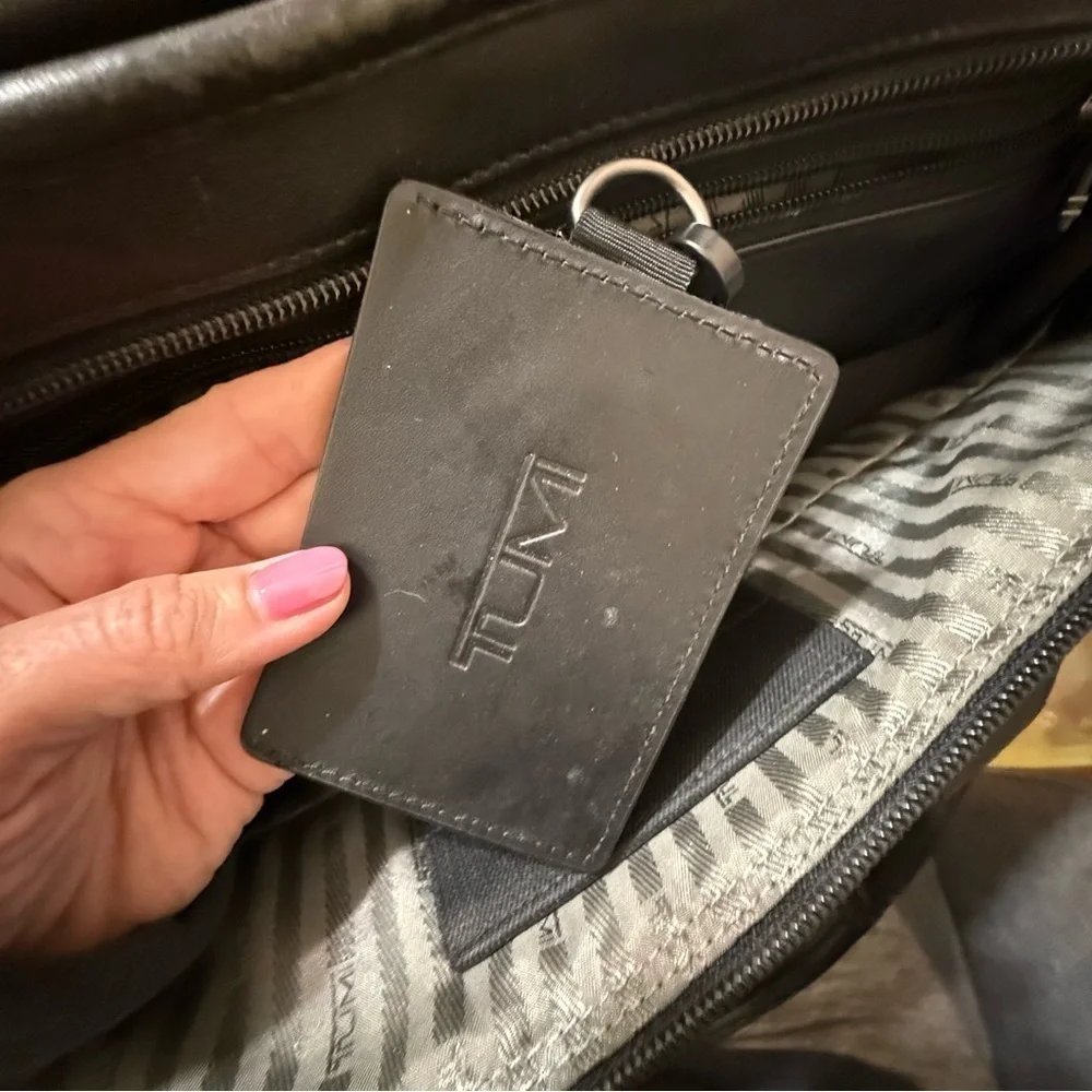 Tumi black leather